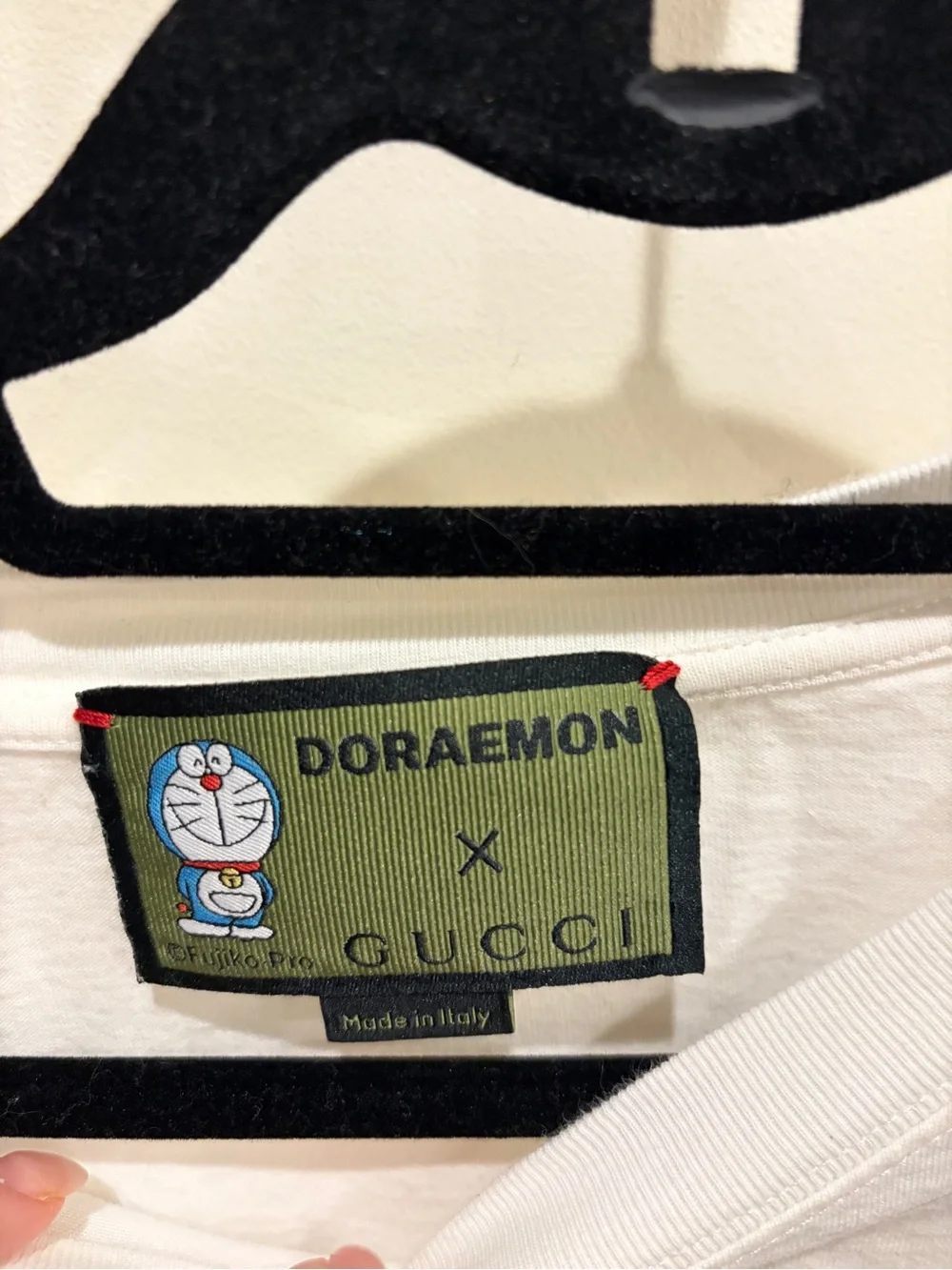 Gucci White Tee with Blue Logo and Doraemon Graphic